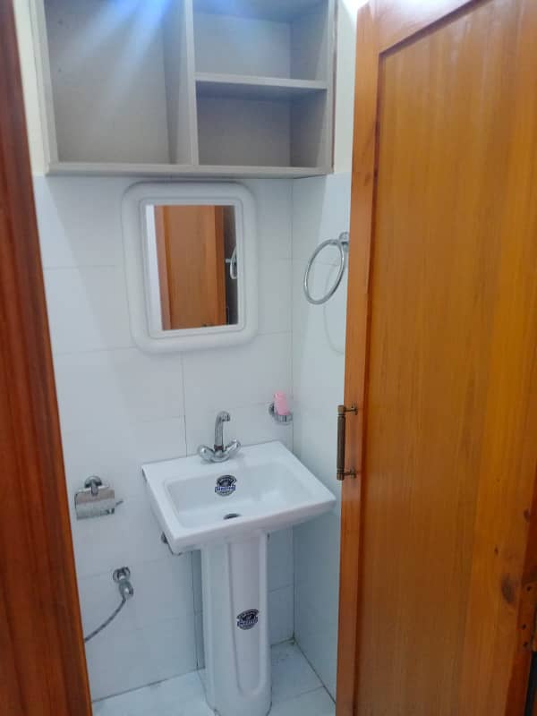 Madina Heights Studio Flat 303 Sqft 7th Floor Lift Parking For Sale Rental Income 20K in Johar Town, Lahore